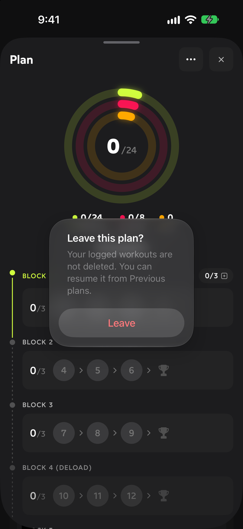 Leave this plan? dialog warning that logged workouts are not deleted, with the Leave button